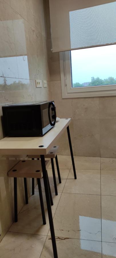 Divina 10 Apartment Aviles Bagian luar foto